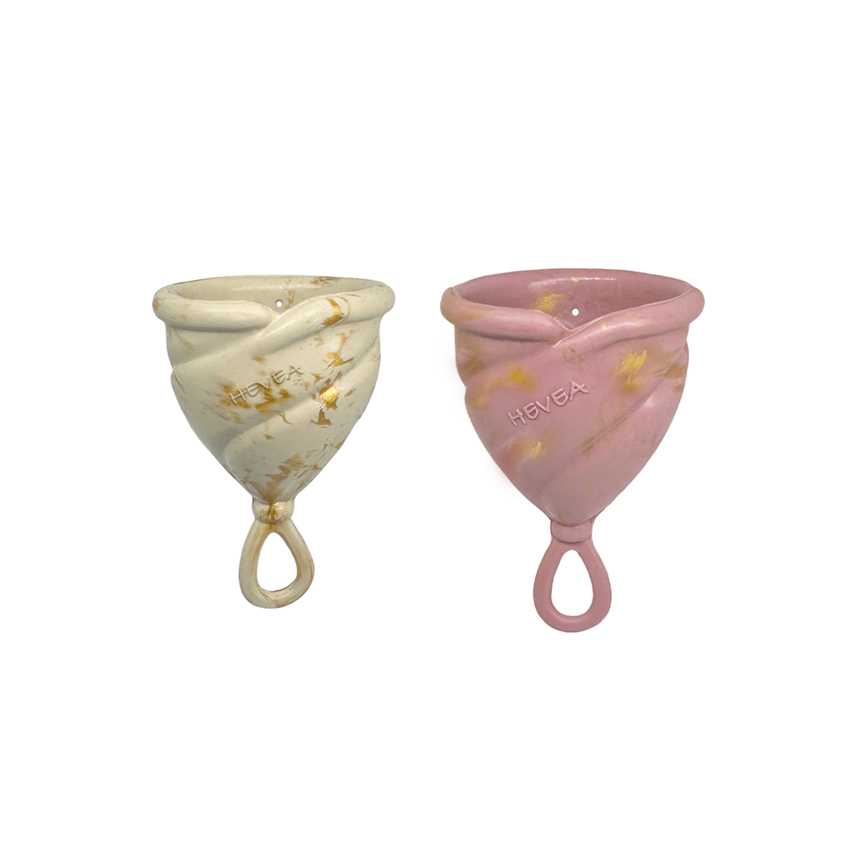 Underprotection menstrual cup in pink and green made of 100% natural rubber