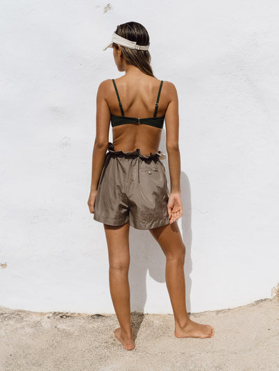 Underprotection track shorts in brown, green and white made from 100% polyester (recycled)